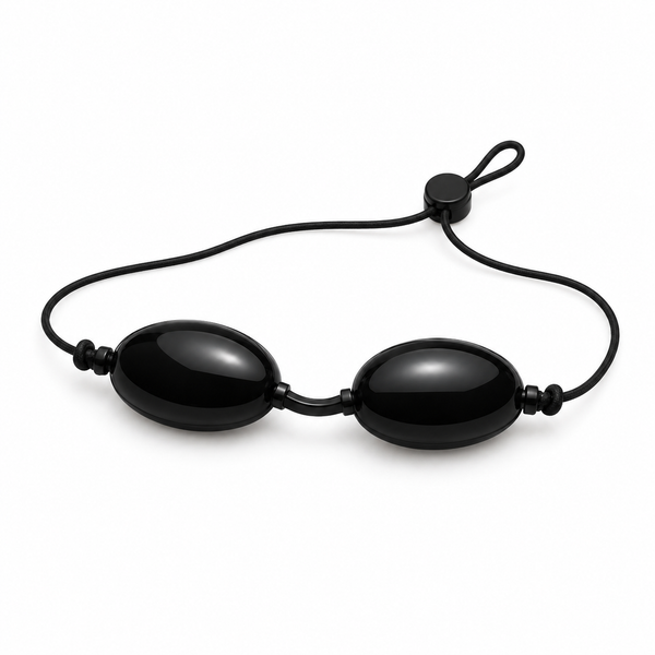 Black beaded necklace on a white background