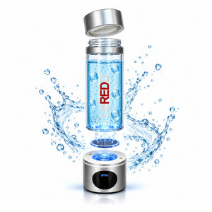 An exploded image view of a transparent cylindrical hydrogen water bottle with a metallic cap floating above a matching metallic base on a white background, surrounded by dynamic blue water splash graphics. The bottle is filled with blue liquid and has the Branding 'LEREDD' printed vertically in  white and red.