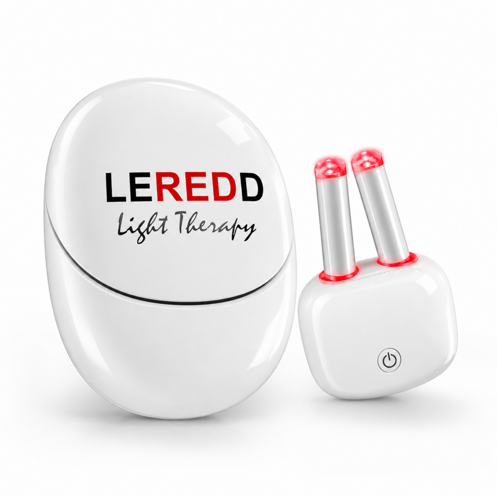 LEREDD light therapy device next to its charging and sterilsation case  for Nasal use  to treat hayfever with two red lights on a white background