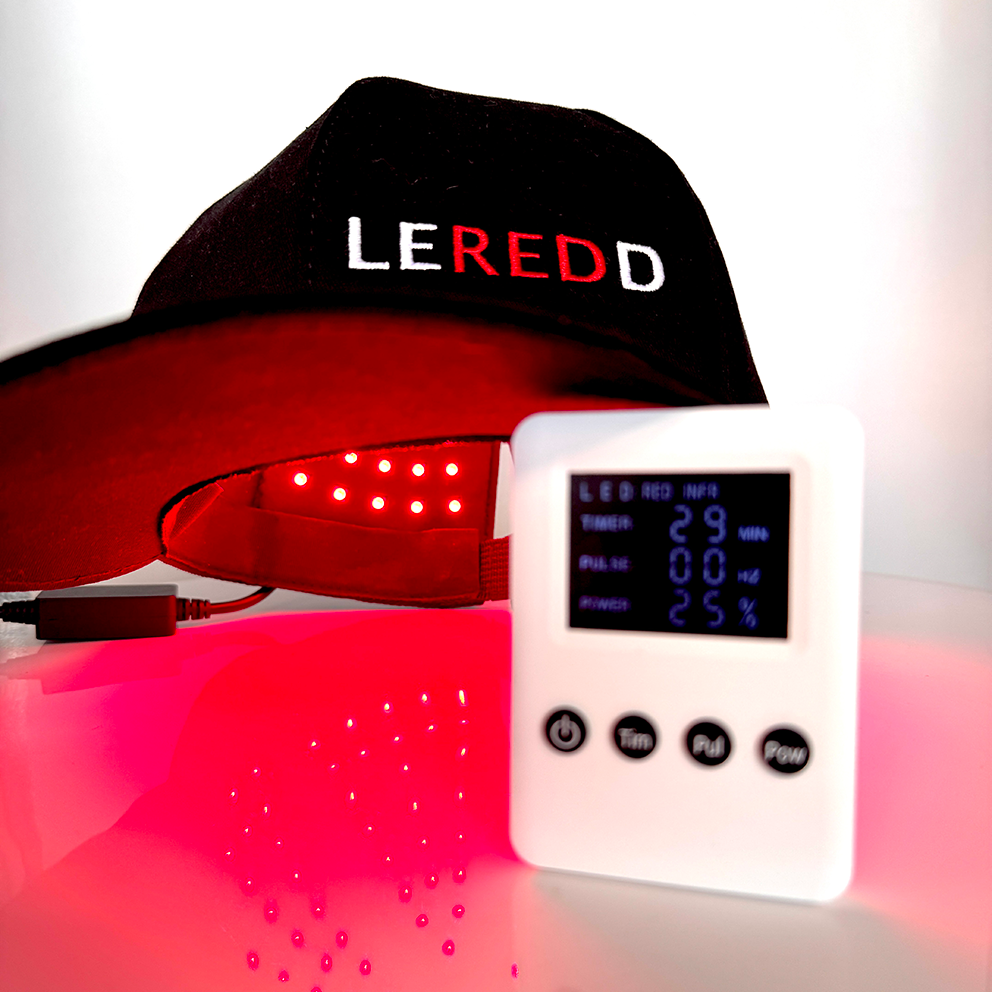 Red light therapy Brain treatment and Hair growth Cap with remote control device on a white background, featuring the brand 'LEREDD'