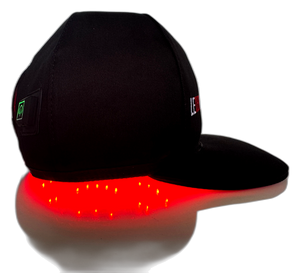 A black flat-brim cap with LED lighting along the brim, casting a bright red glow, shown on a white background with a reflection.