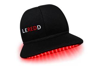 A black flat-brim cap with 'LEREDD' embroidered on the front, featuring glowing red LED lights along the underside of the brim, shown against a solid white background.